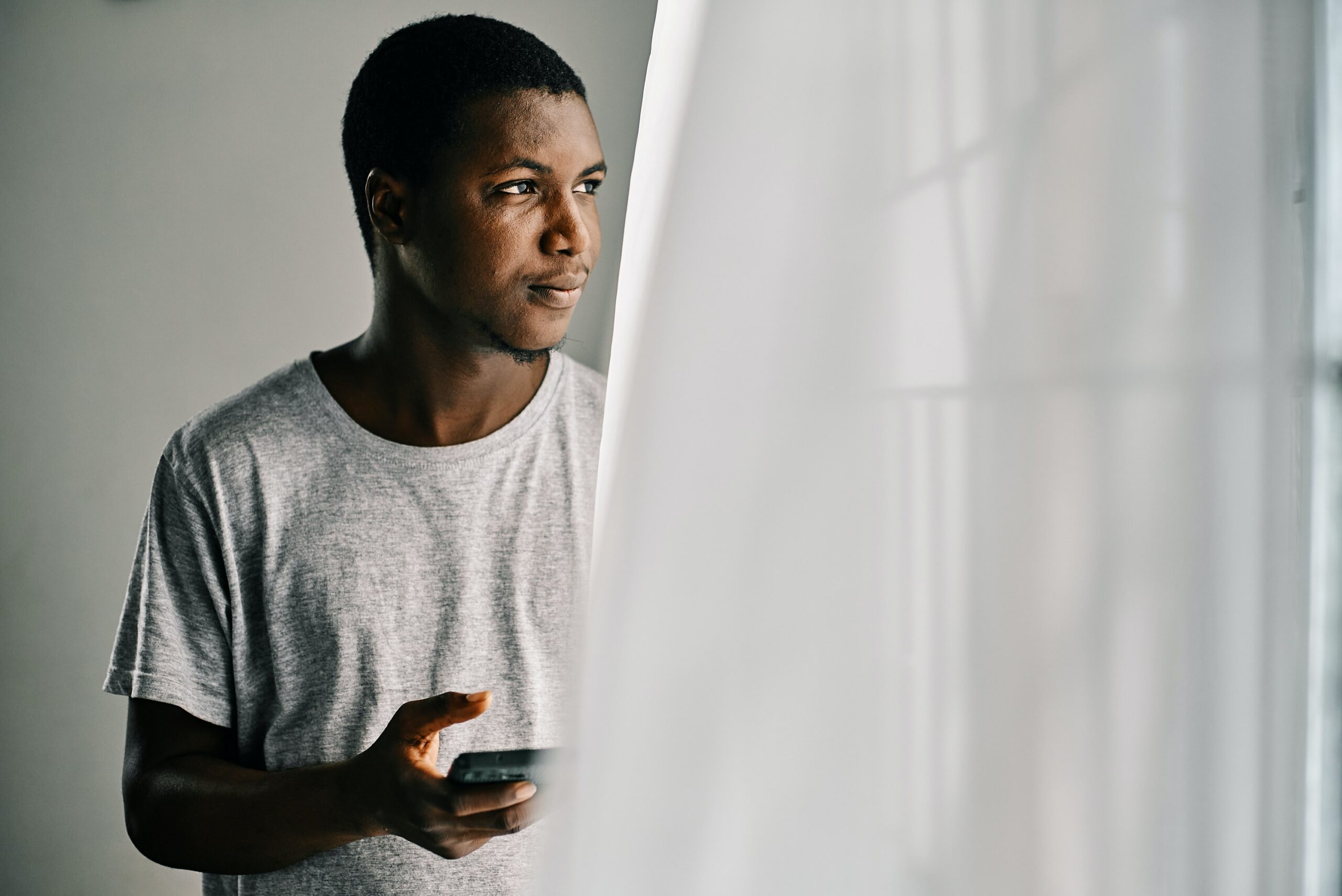 an image of a man looking content from the benefits of lower costing bank transfer payments and no chargeback risks using open banking